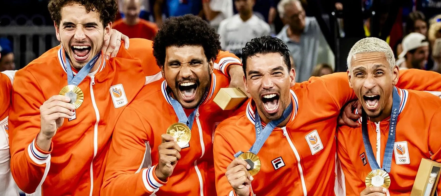 Dutch 3x3 basketball team showing their Gold medals, during the Paris 2025 Olympics